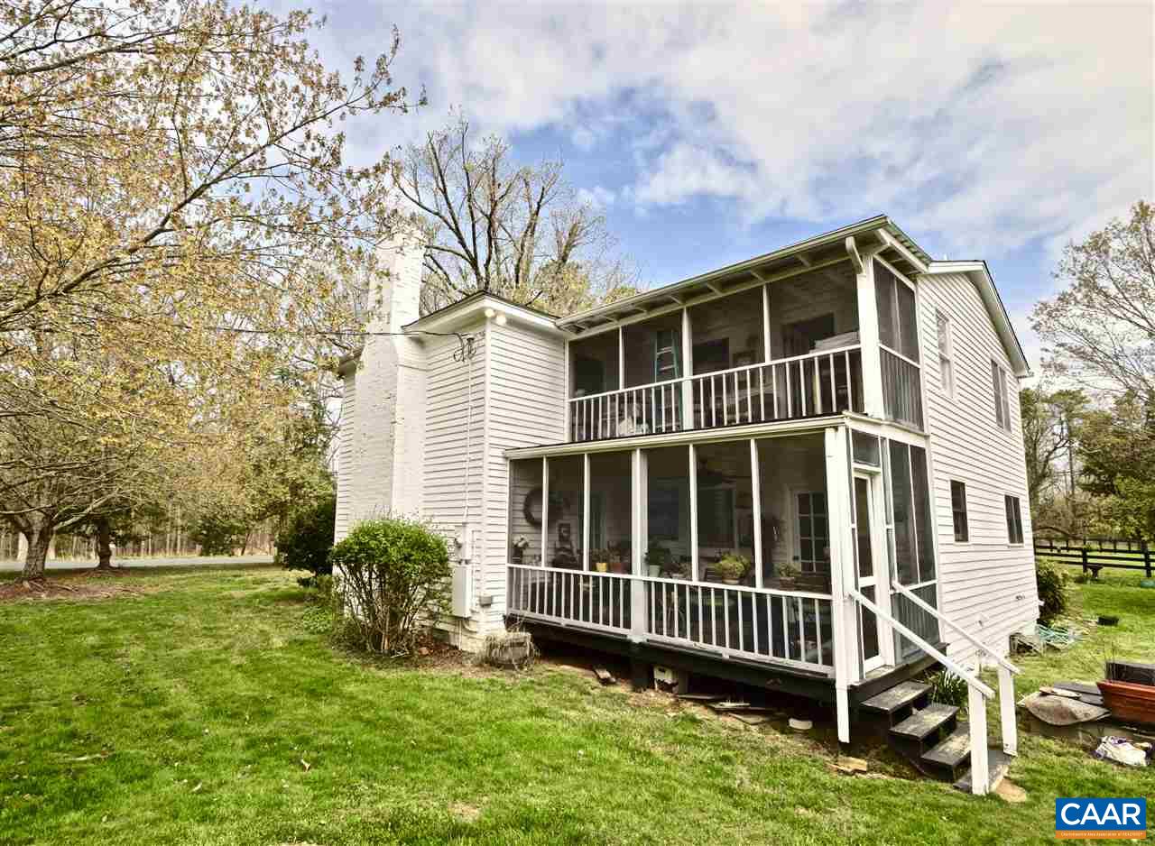 237 Campbell Road Keswick, VA 22947 - Photo 3 of 41 a view of a house with backyard and garden