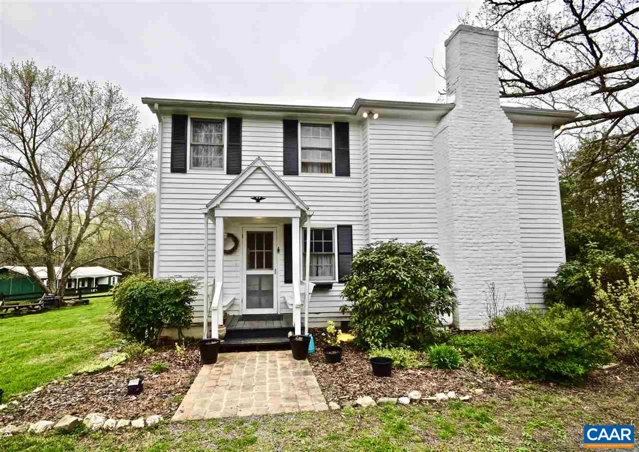 237 Campbell Road Keswick, VA 22947 - Photo 38 of 41 a front view of a house with a yard