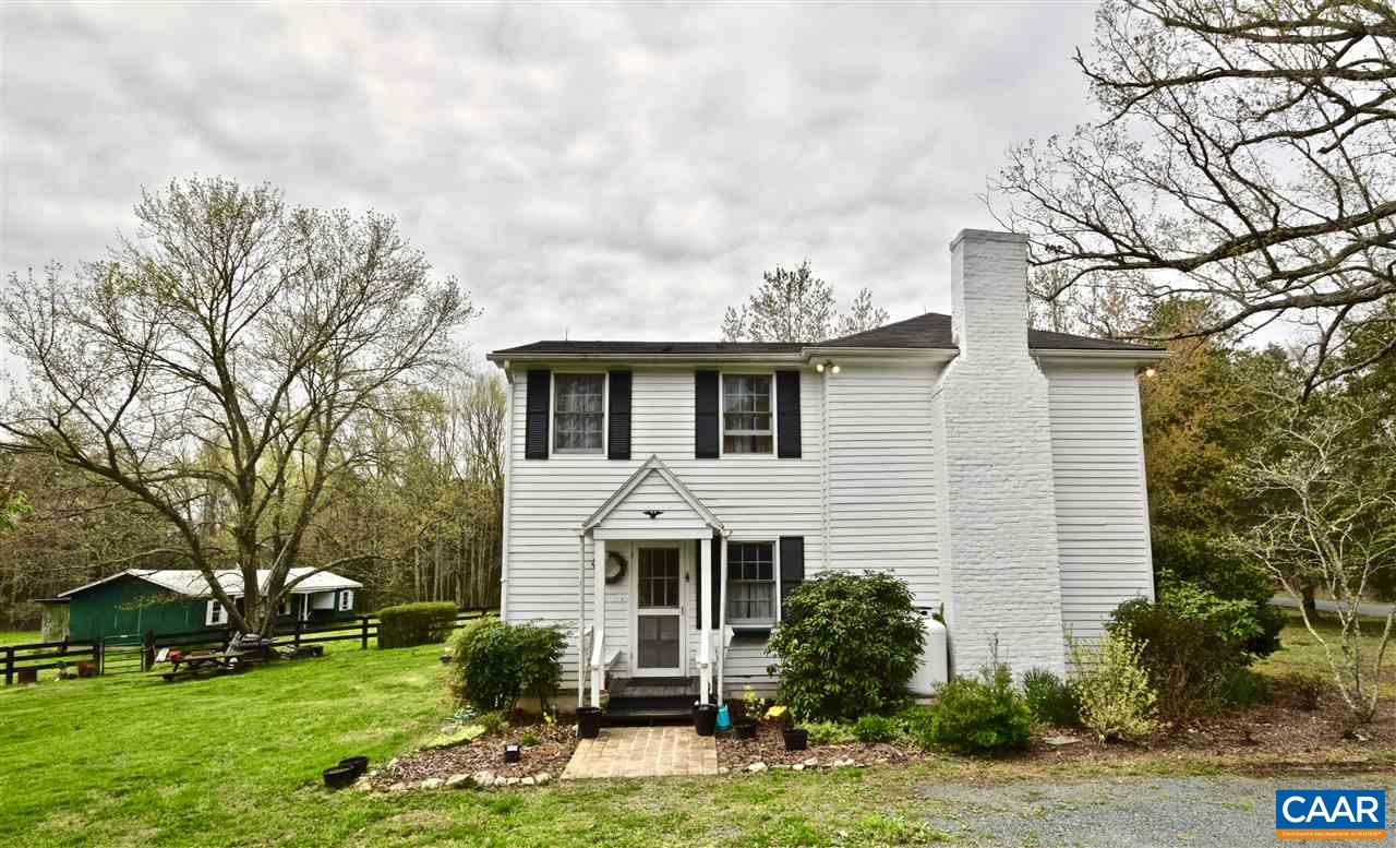 237 Campbell Road Keswick, VA 22947 - Photo 5 of 41 a front view of a house with garden