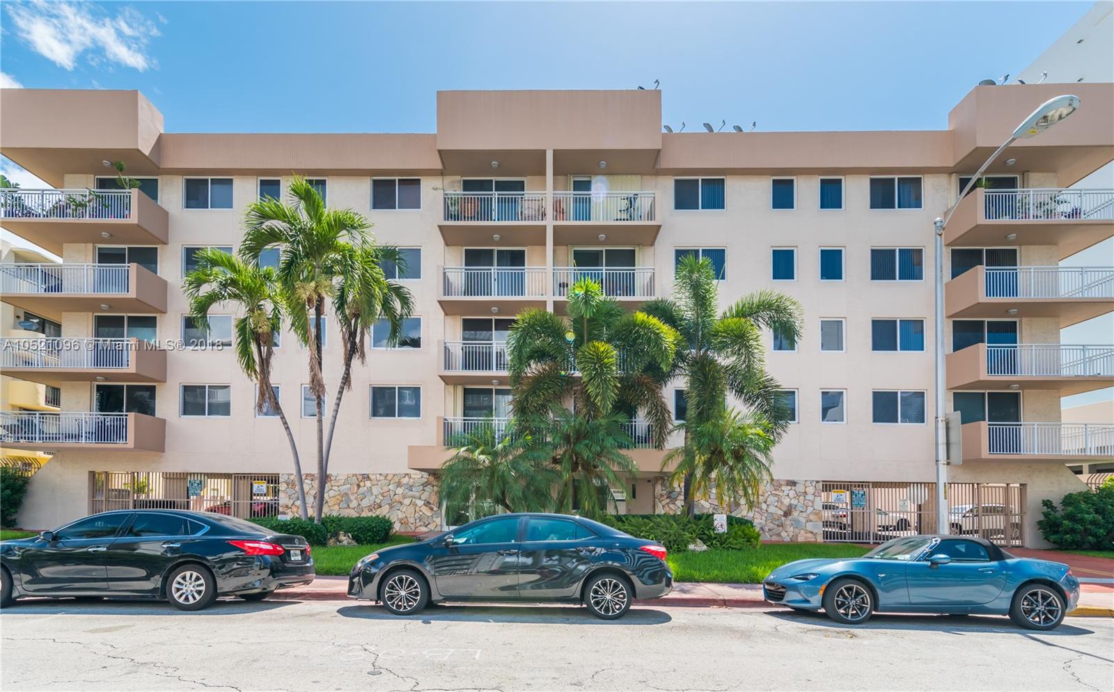 1665 Bay Road, Unit 425 Miami Beach, FL 33139 - Photo 15 of 15 a car parked in front of a building