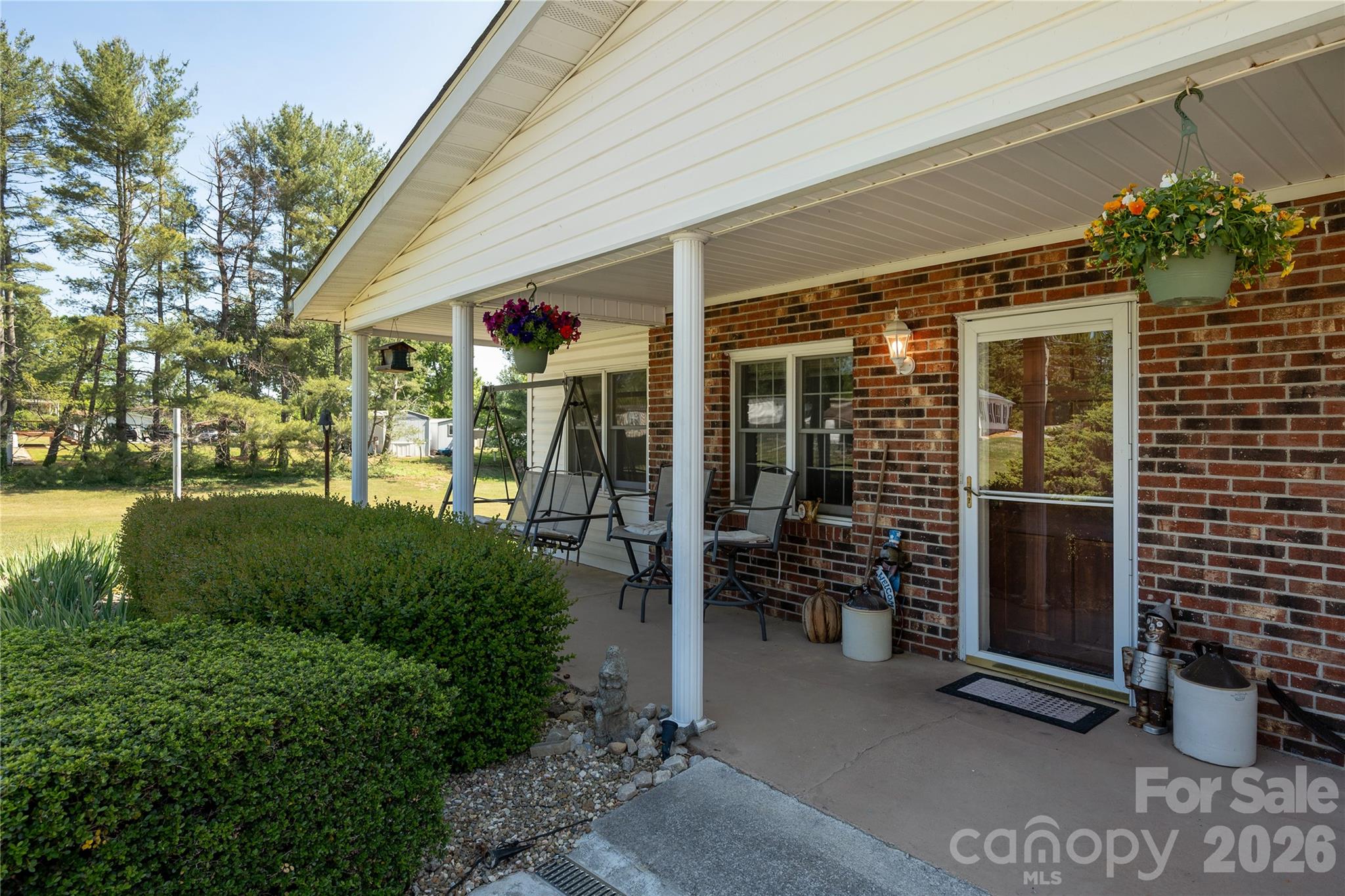231 Allen Road East Flat Rock, NC 28726 - Photo 4 of 42 a view of a porch with seating space