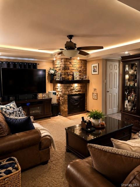 700 Sharon Road Copiague, NY 11726 - Photo 3 of 27 a living room with furniture and a flat screen tv