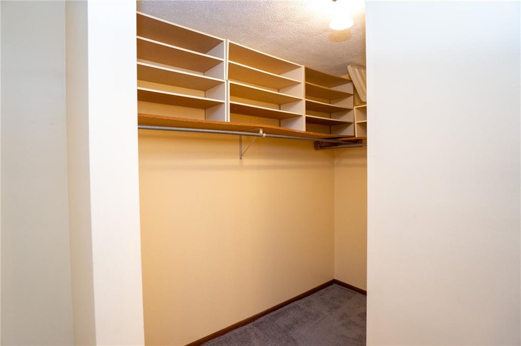 7324 Green Meadow Drive Imperial, PA 15126 - Photo 14 of 43 a view of walk in closet with empty racks