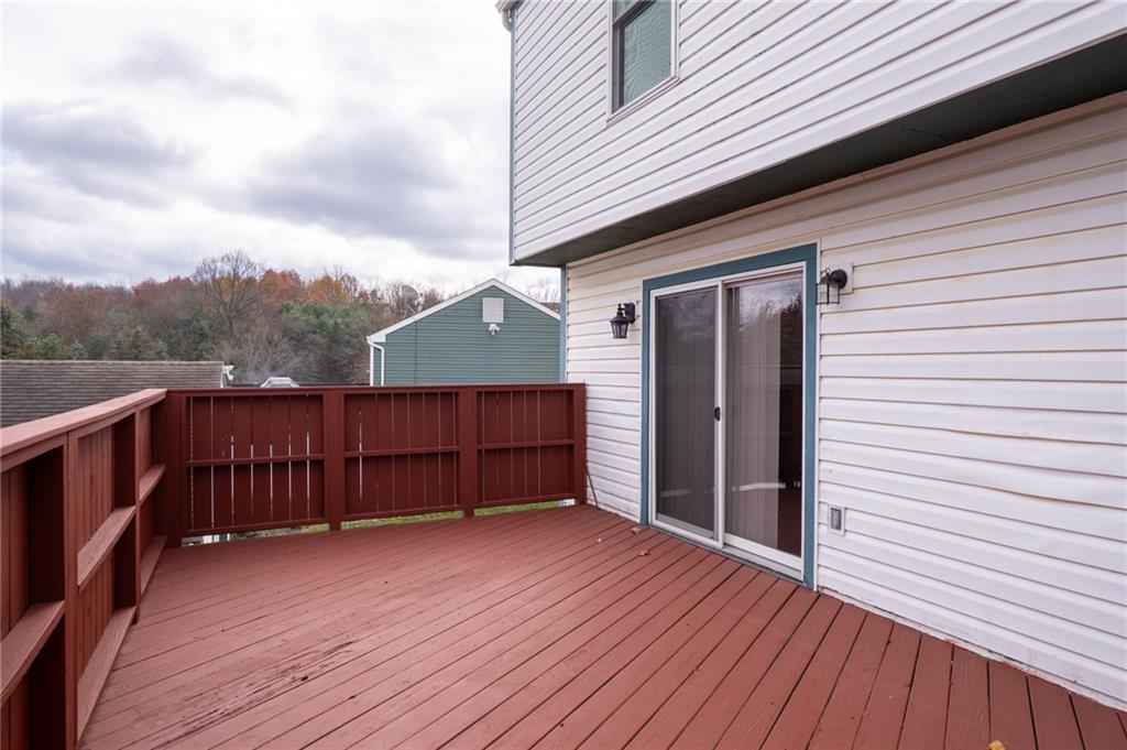 7324 Green Meadow Drive Imperial, PA 15126 - Photo 36 of 43 a view of a house with wooden deck