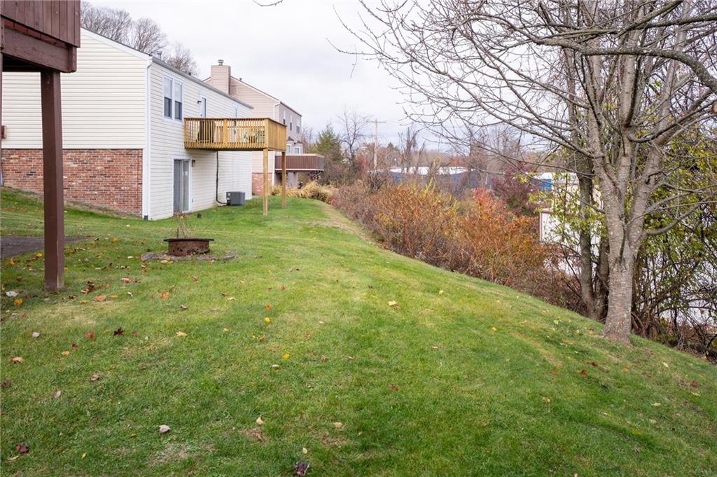 7324 Green Meadow Drive Imperial, PA 15126 - Photo 40 of 43 a backyard of a house with lots of green space