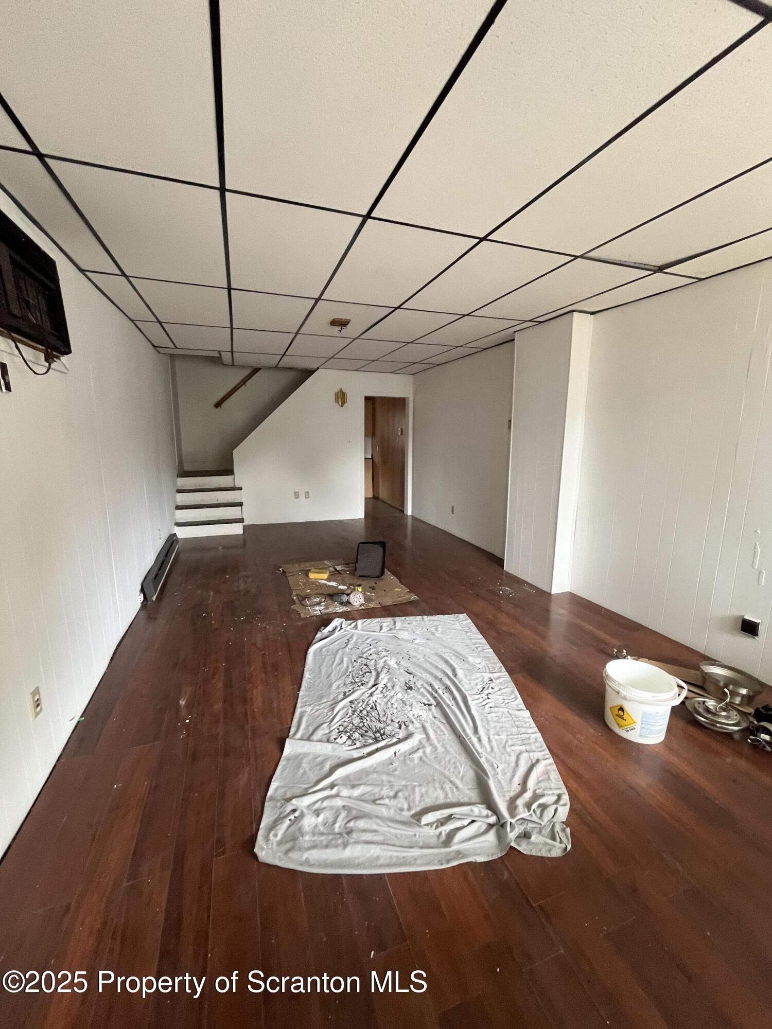 219 Ash Street Scranton, PA 18509 - Photo 2 of 11 a view of a room with wooden floor