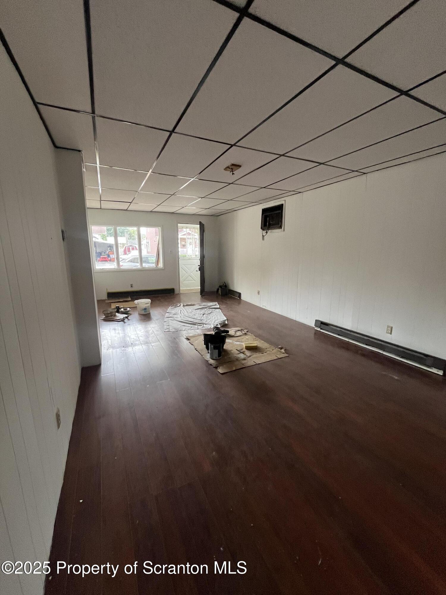 219 Ash Street Scranton, PA 18509 - Photo 3 of 11 a view of a room with gym equipment