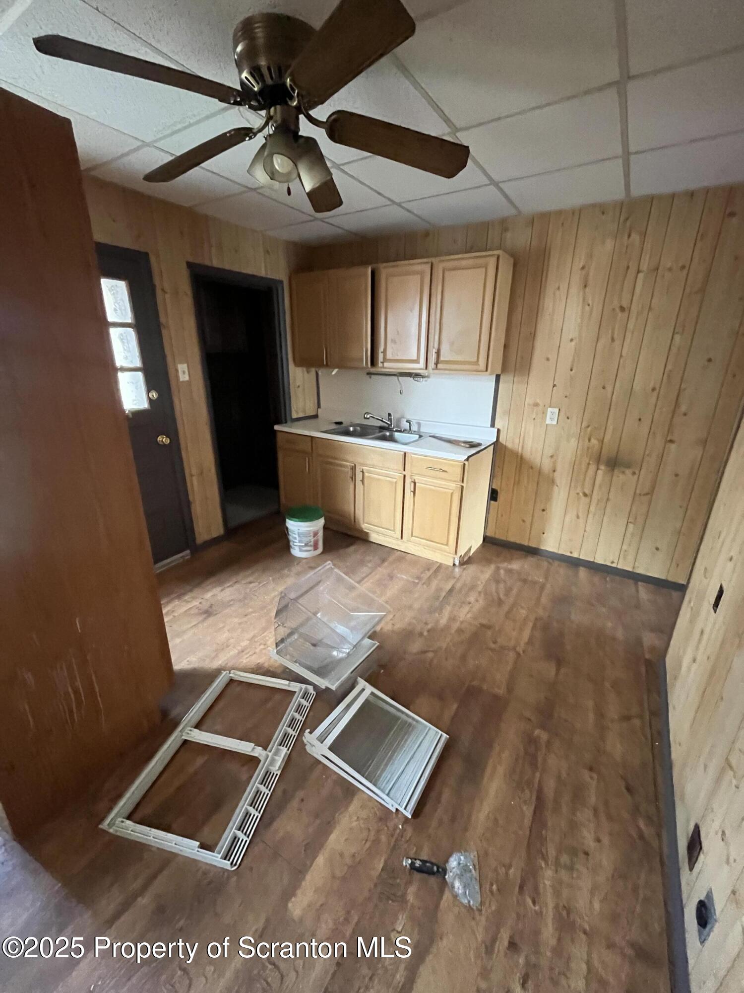 219 Ash Street Scranton, PA 18509 - Photo 4 of 11 a room with pool table and a chandelier