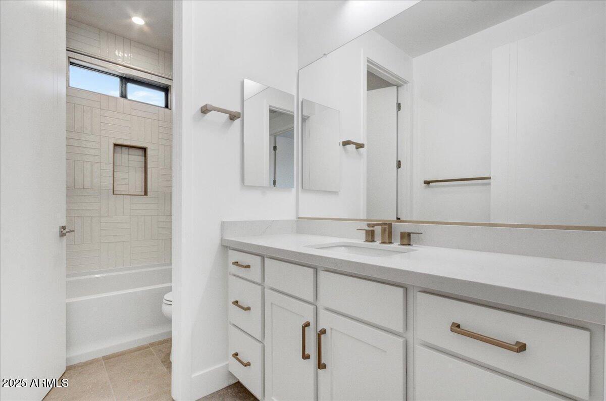 100 West Northern Avenue, Unit 4 Phoenix, AZ 85021 - Photo 16 of 25 a bathroom with a granite countertop sink mirror and double