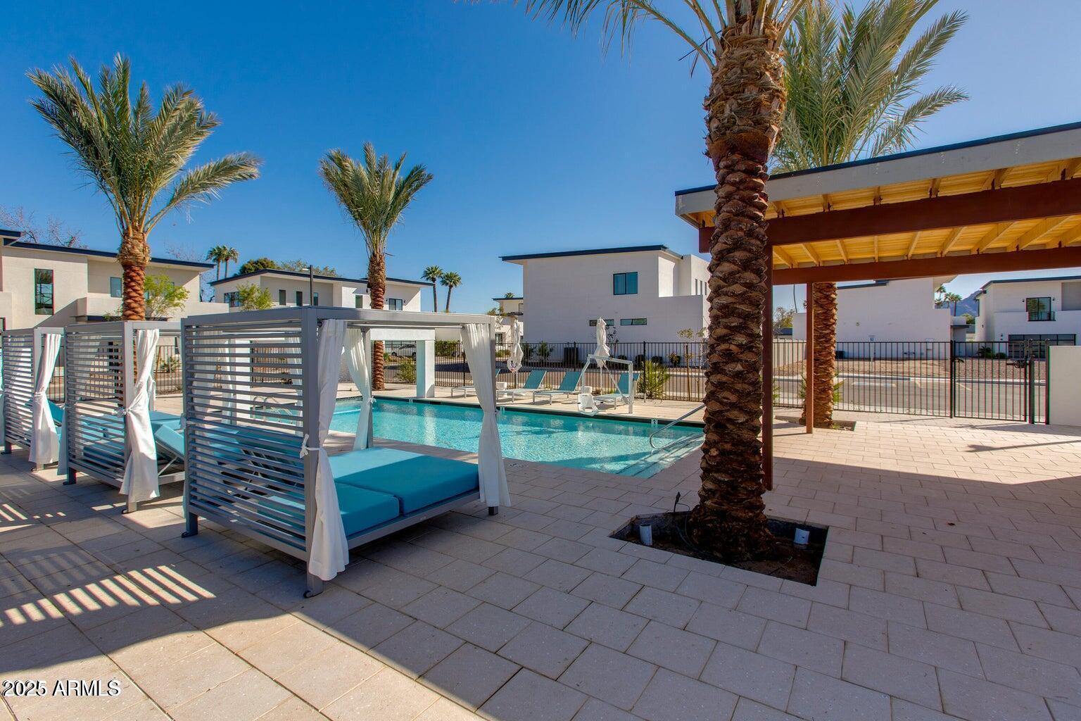 100 West Northern Avenue, Unit 4 Phoenix, AZ 85021 - Photo 25 of 25 a front view of a house with garden and patio