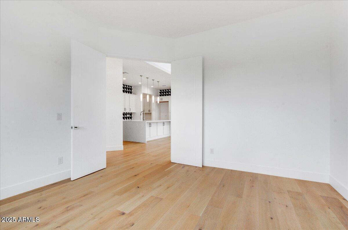 100 West Northern Avenue, Unit 4 Phoenix, AZ 85021 - Photo 6 of 25 a view of a kitchen with wooden floor