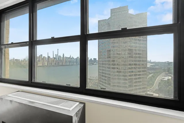 a bathroom with a bathtub shower sink vanity and toilet