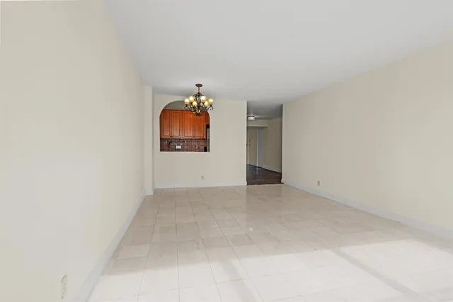 an empty room with a fireplace