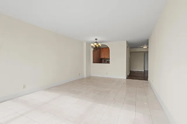 an empty room with a bathroom