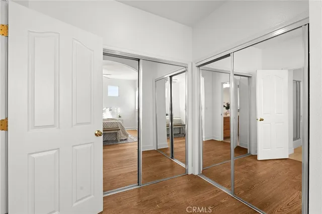 a bathroom with a glass shower door and a glass door