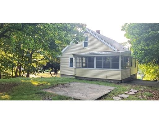 48 Mt Walley Road Waltham, MA 02451 - Photo 17 of 23 a front view of a house with a garden