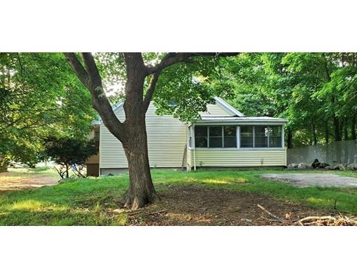 48 Mt Walley Road Waltham, MA 02451 - Photo 19 of 23 a front view of a house with a garden
