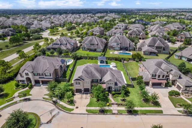 an aerial view of multiple house