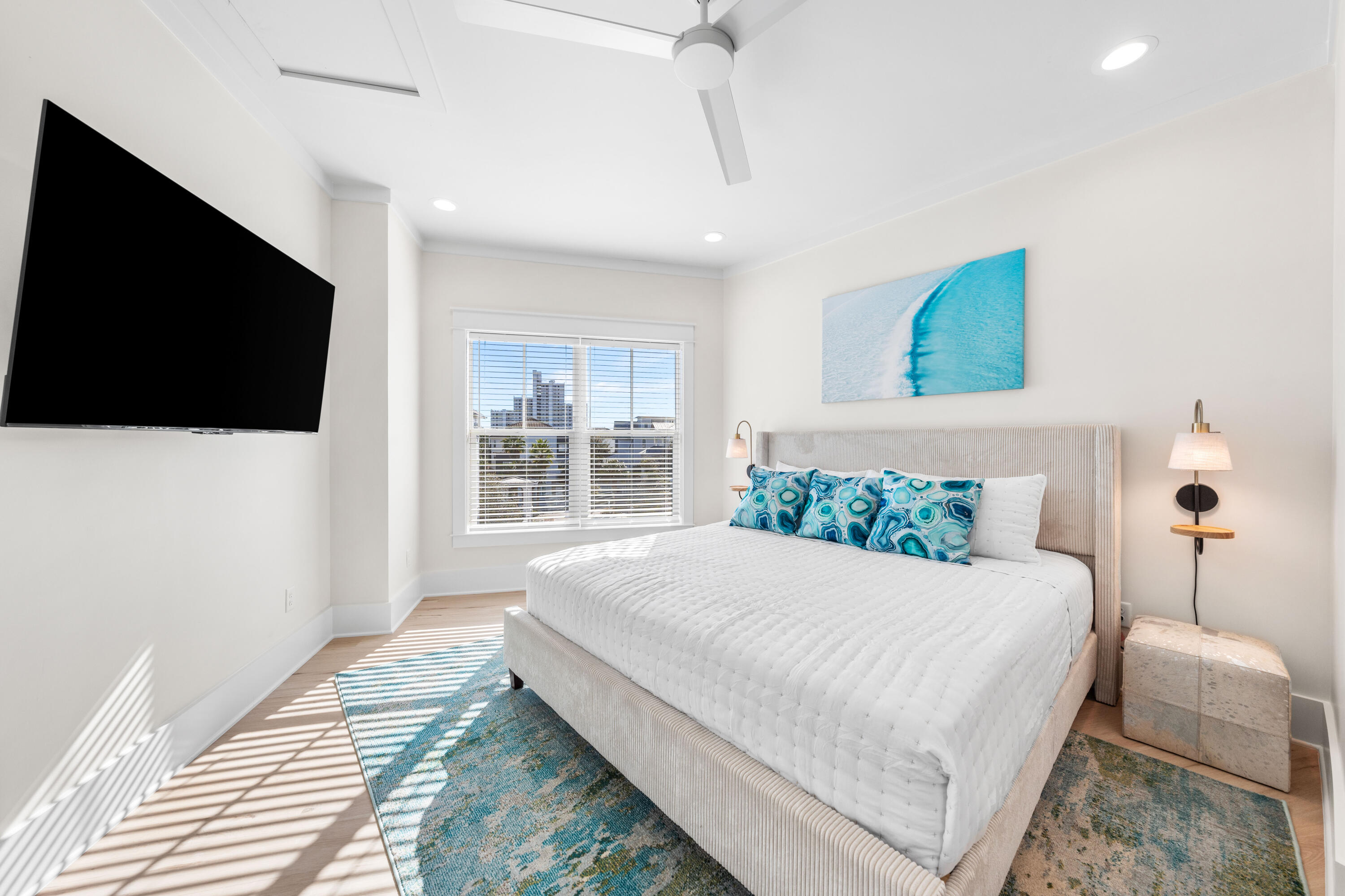 75 Sawgrass Lane Santa Rosa Beach, FL 32459 - Photo 32 of 39 a bedroom with a large bed and a flat screen tv