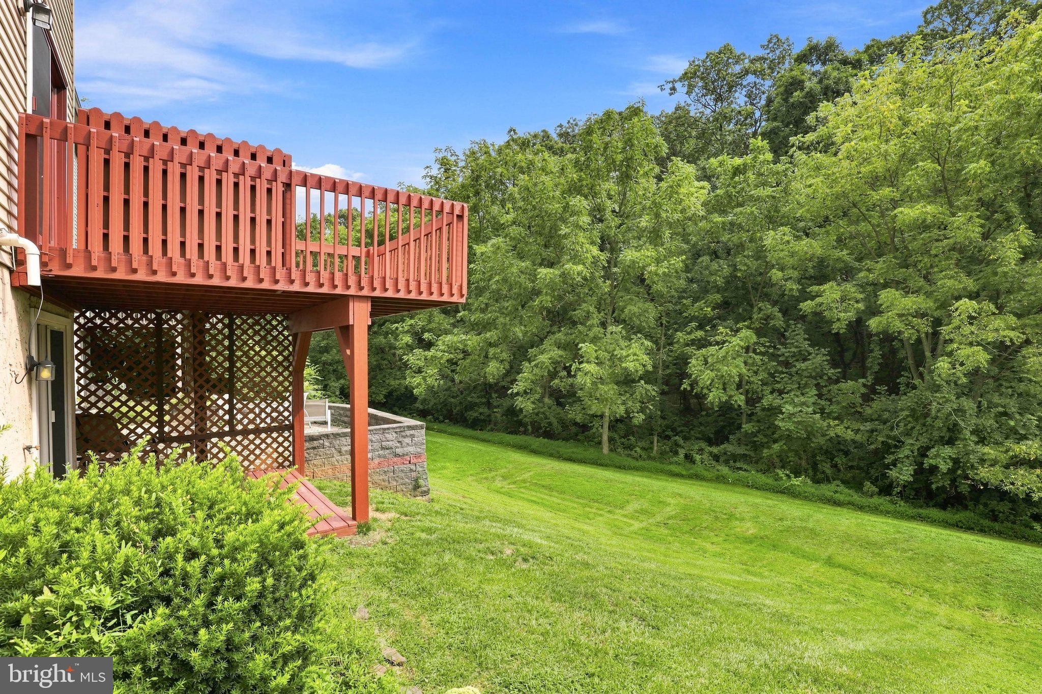 366 Crosswinds Drive Lititz, PA 17543 - Photo 27 of 35 Serene backyard retreat with lush greenery.