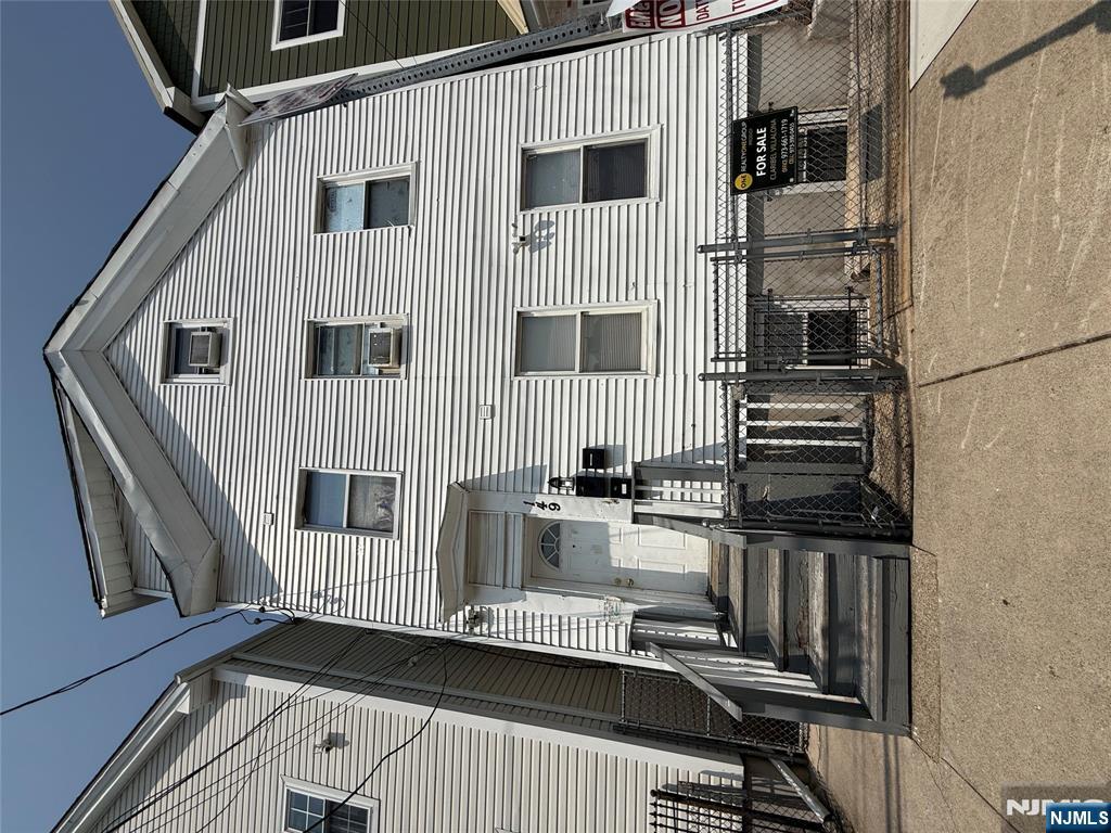 149 Camden Street Newark, NJ 07103 - Photo 1 of 3 a front view of a house