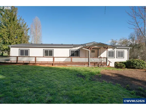 a house view with a garden space