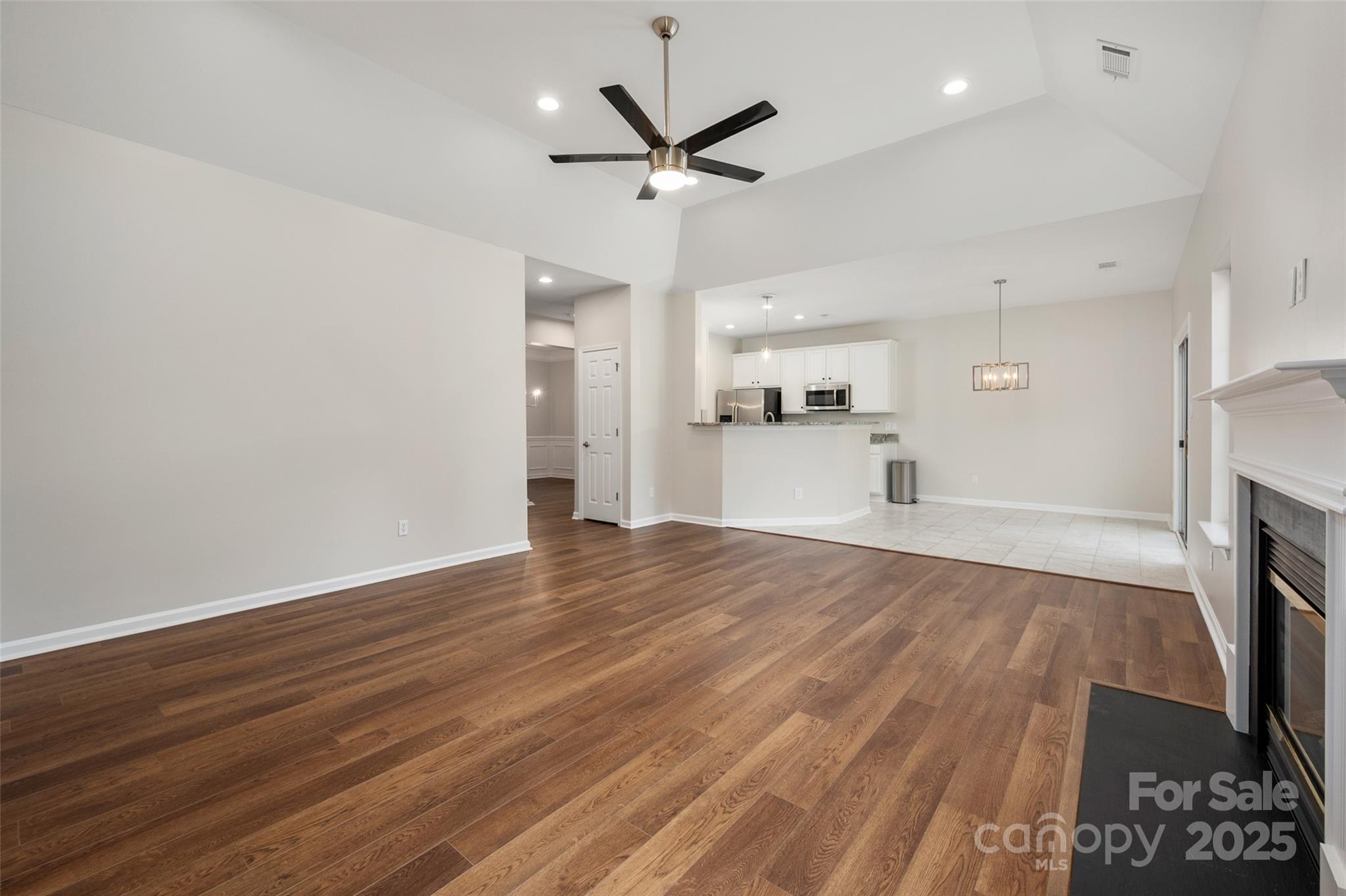 1004 Toquima Trail Monroe, NC 28110 - Photo 15 of 38 a view of a kitchen with a sink and a stove