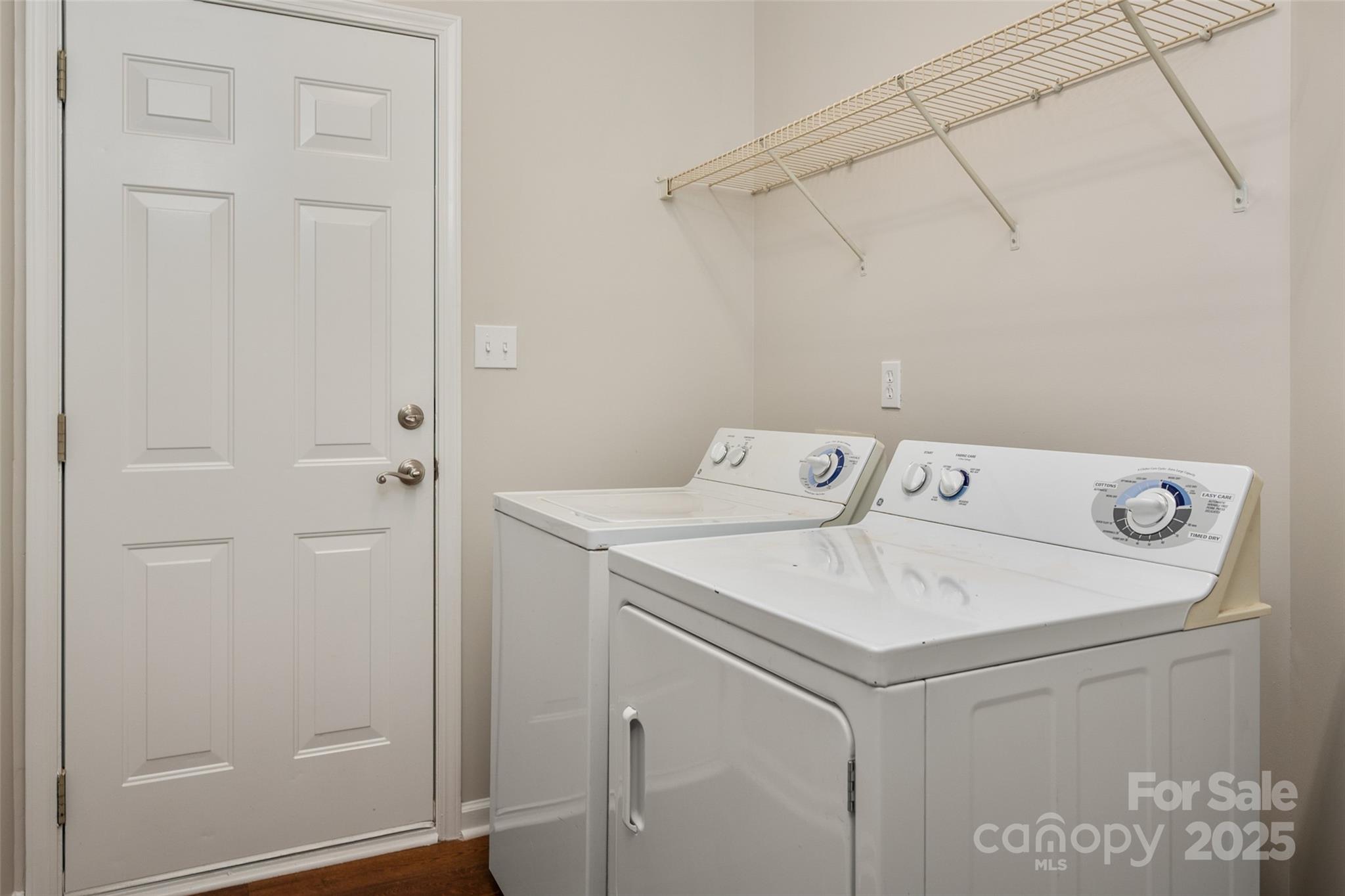 1004 Toquima Trail Monroe, NC 28110 - Photo 28 of 38 a utility room with dryer and washer
