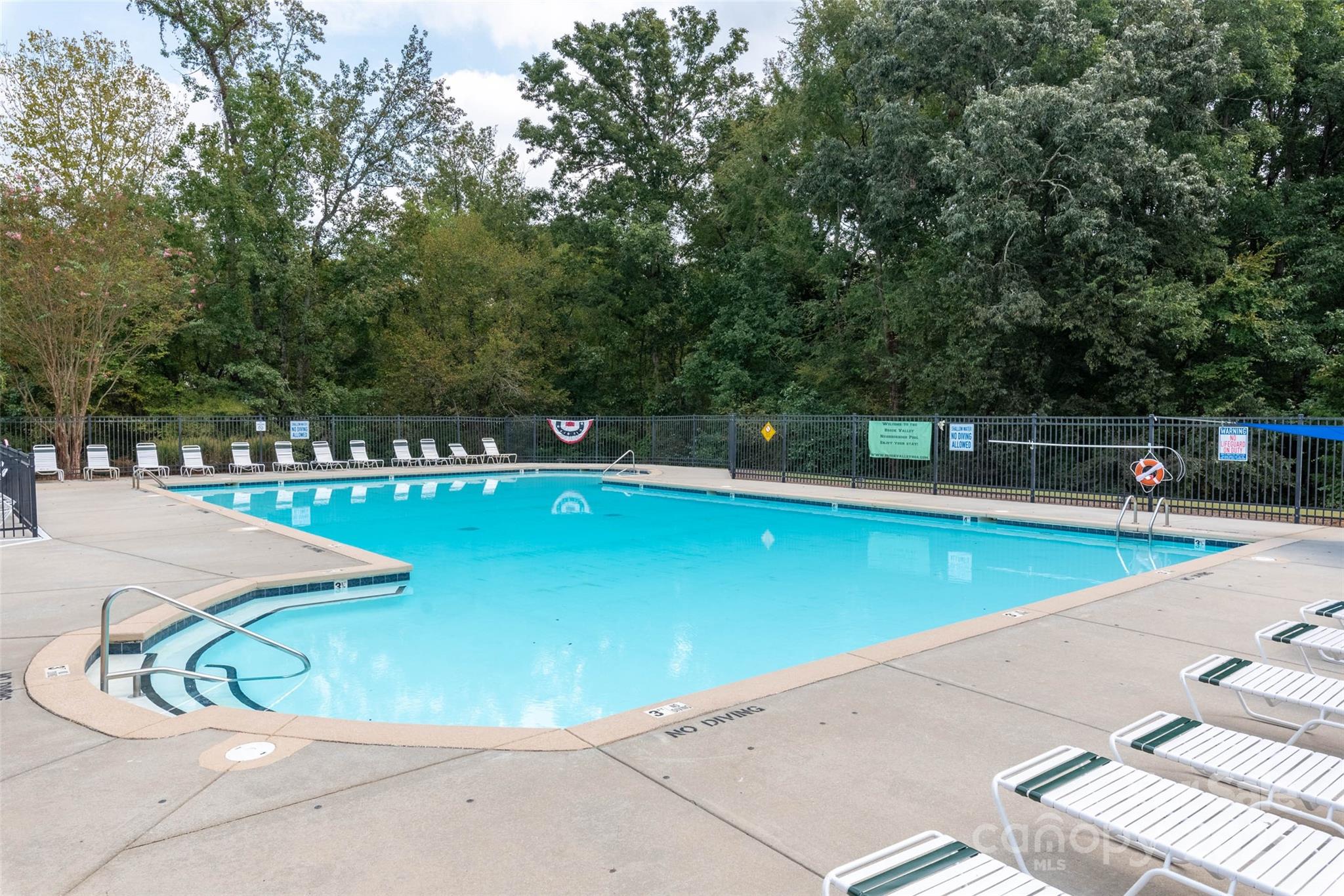 1004 Toquima Trail Monroe, NC 28110 - Photo 35 of 38 a view of a swimming pool with an outdoor space