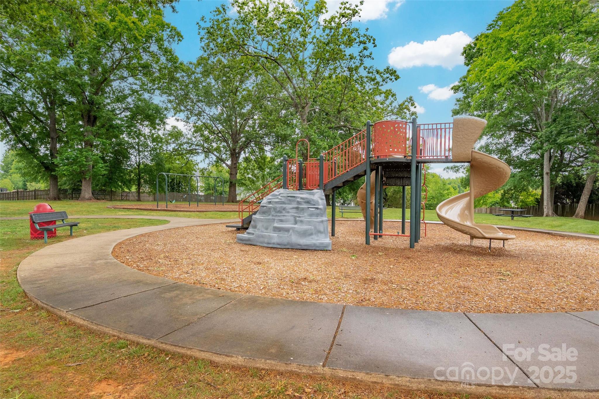 1004 Toquima Trail Monroe, NC 28110 - Photo 37 of 38 a backyard of a house with table and chairs