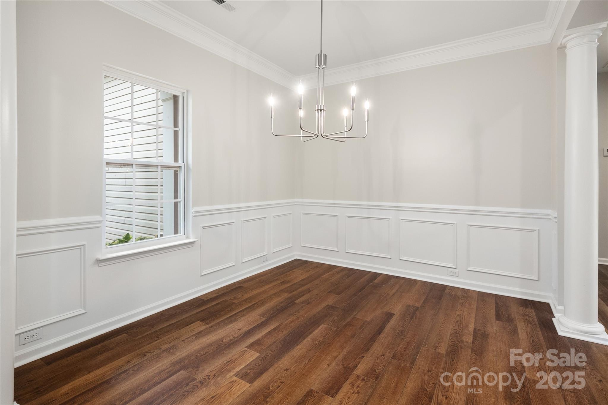 1004 Toquima Trail Monroe, NC 28110 - Photo 4 of 38 a view of empty room with wooden floor and fan
