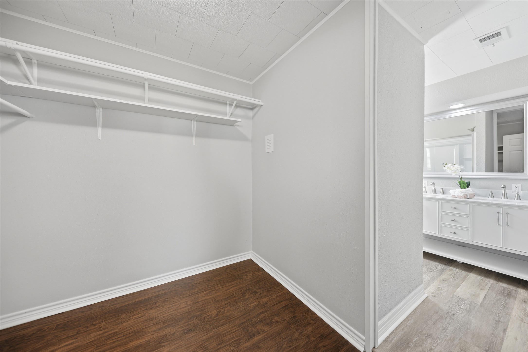 1702 Rampart Street Columbus, TX 78934 - Photo 13 of 38 a view of cabinets and wooden floor