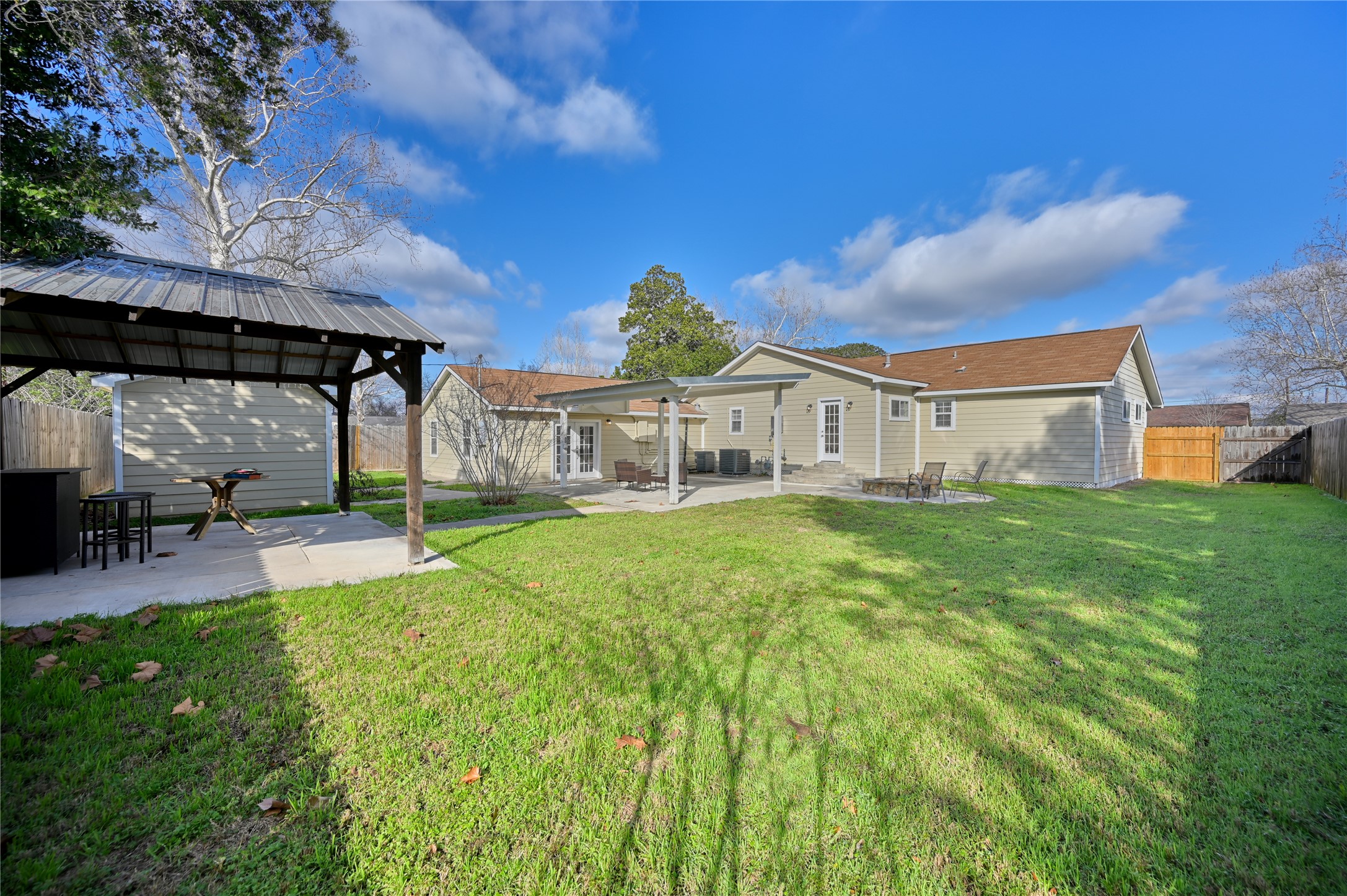 1702 Rampart Street Columbus, TX 78934 - Photo 19 of 38 a view of house with garden