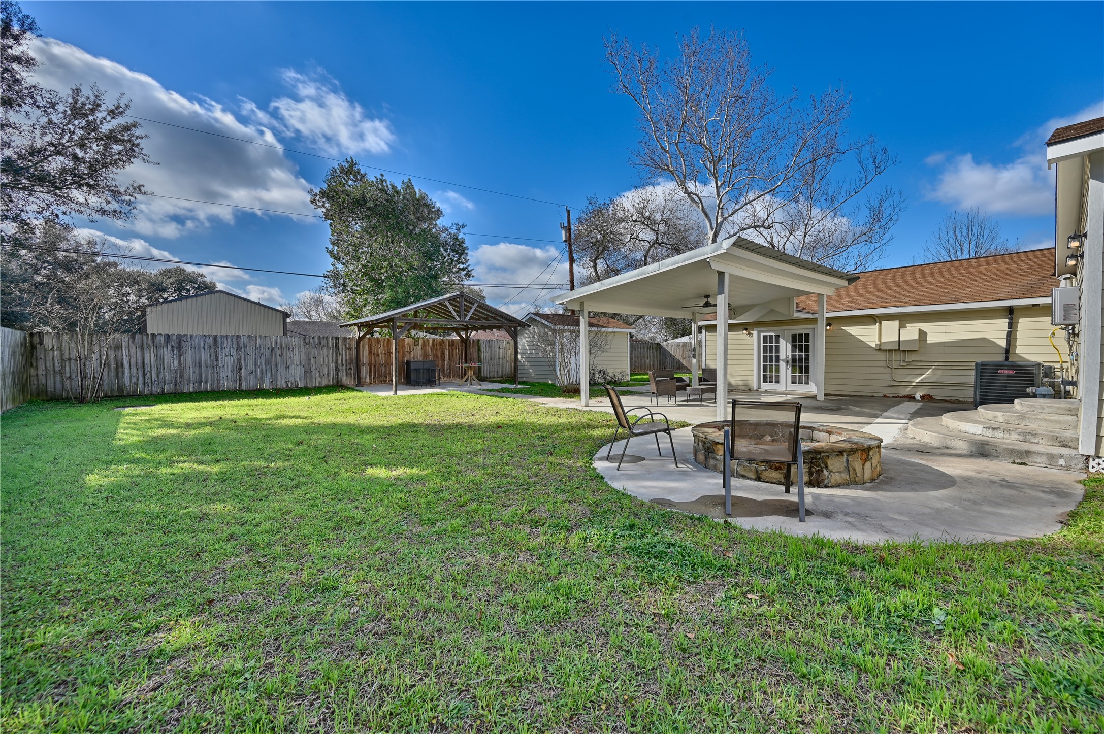 1702 Rampart Street Columbus, TX 78934 - Photo 23 of 38 a front view of a house with garden