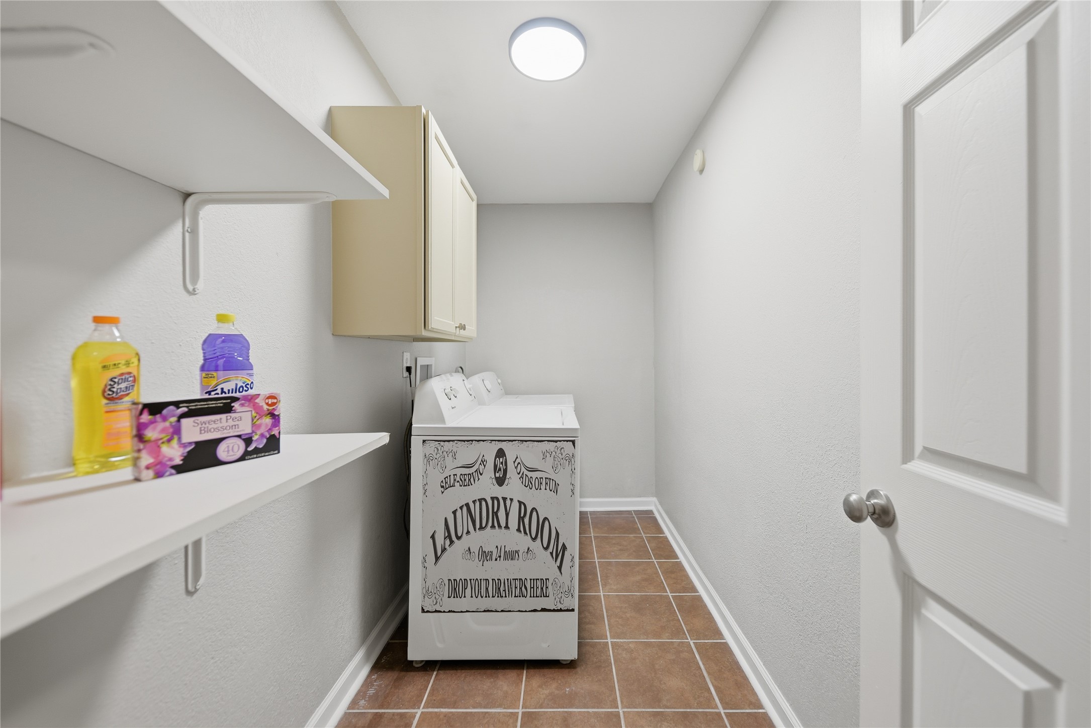 1702 Rampart Street Columbus, TX 78934 - Photo 32 of 38 a utility room with dryer and washer
