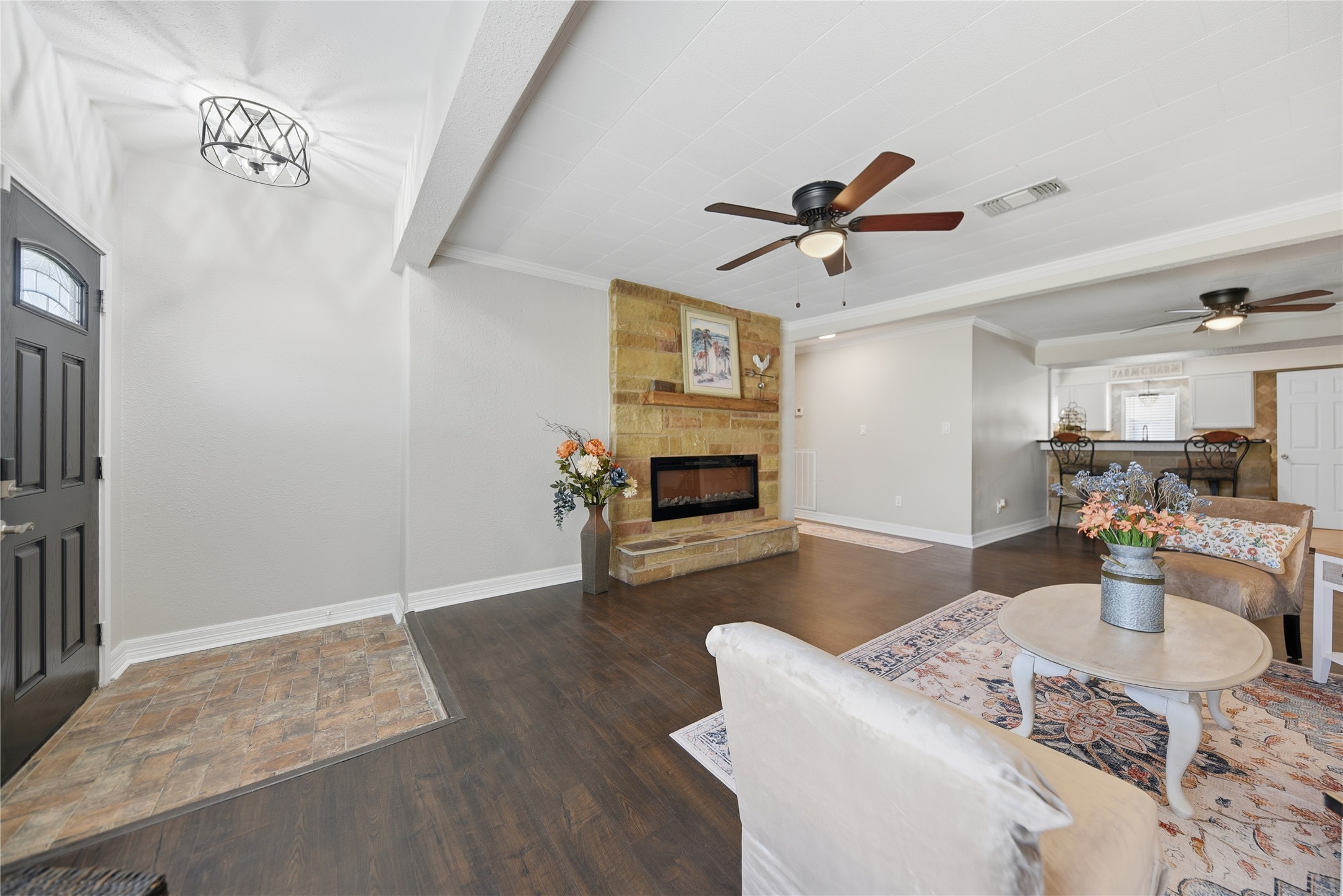 1702 Rampart Street Columbus, TX 78934 - Photo 34 of 38 a living room with furniture and a wooden floor
