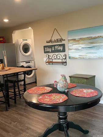 a view of a dining room with furniture