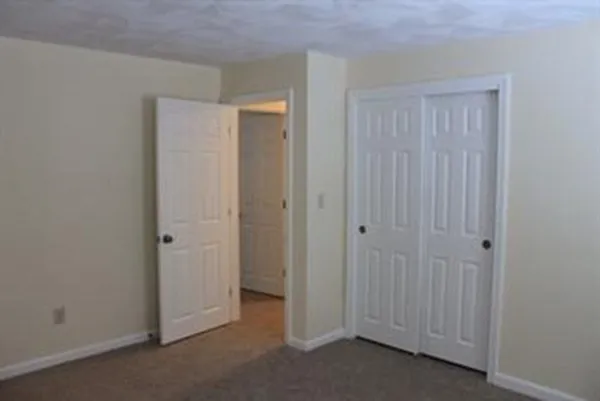 a bathroom with a shower and a bathtub