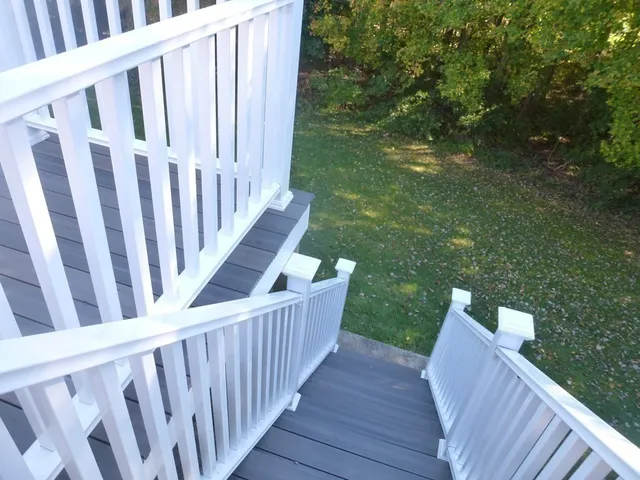 a view of a wooden fence