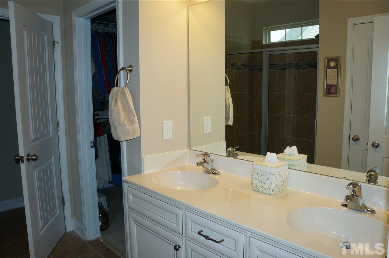 2316 Everstone Road Wake Forest, NC 27587 - Photo 13 of 25 Double Vanities, walk in closet, private water closet, large walk in shower.