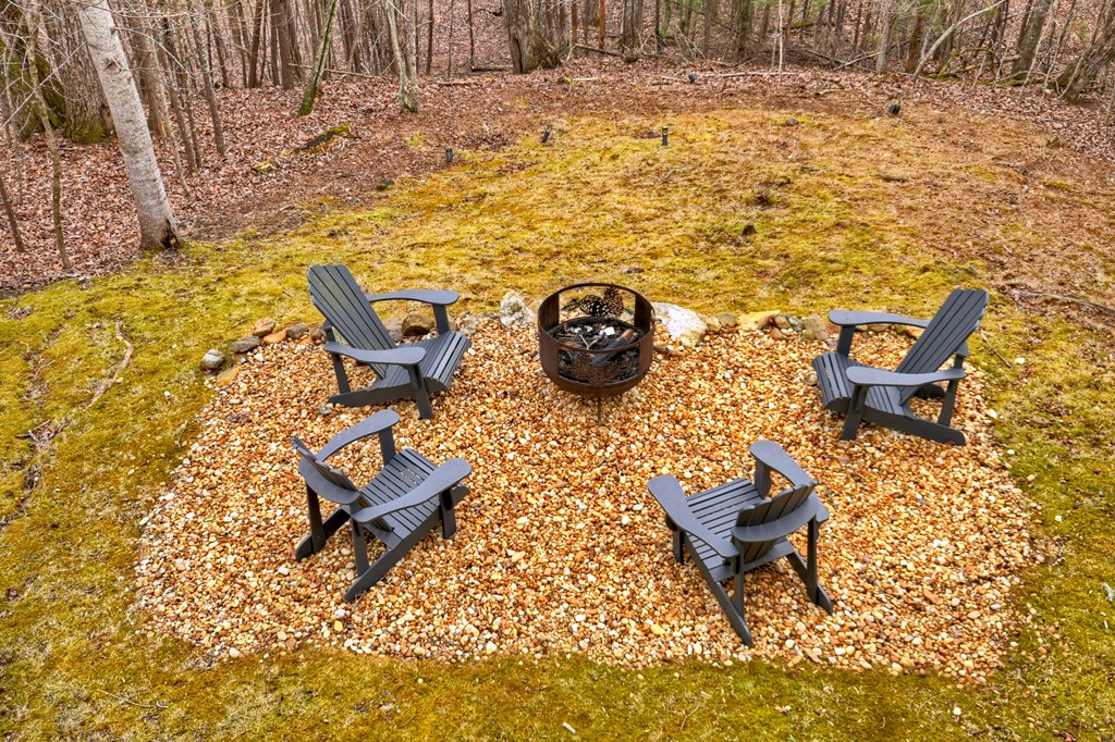 54 Channing Ridge Road Morganton, GA 30560 - Photo 8 of 54 a view of a backyard with table and chairs