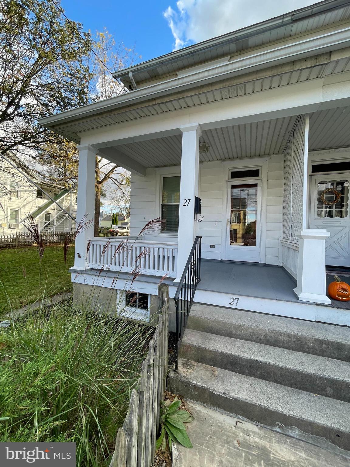 27 West High Street Hummelstown, PA 17036 - Photo 1 of 17 a view of a patio with a table and chairs