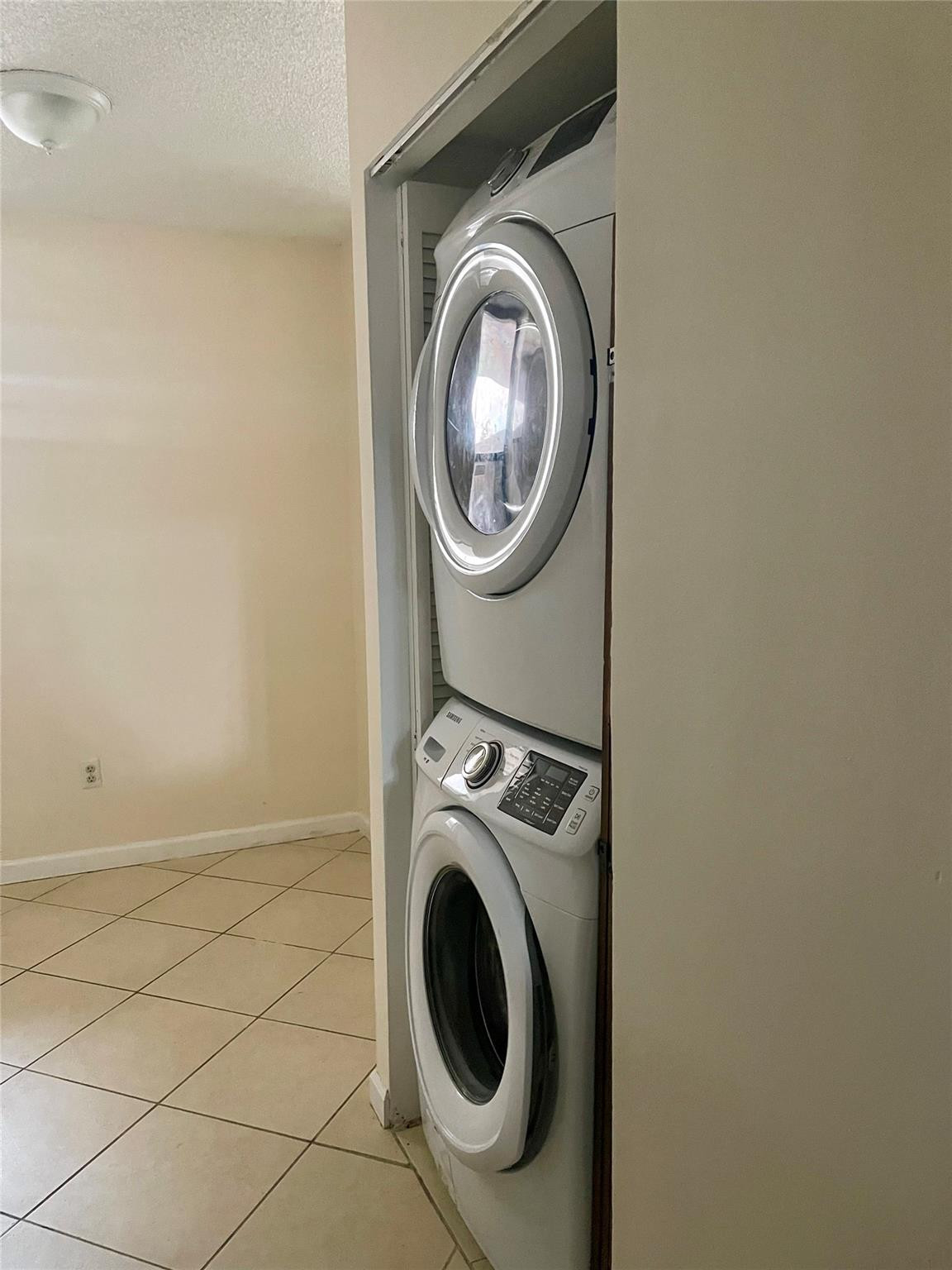 6800 Cypress Road, Unit 413 Plantation, FL 33317 - Photo 10 of 10 a utility room with dryer and washer