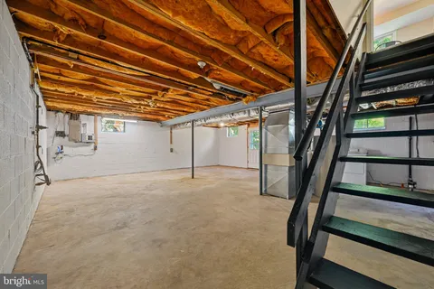 a view of an empty room with closet area