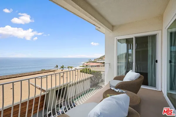a balcony with furniture