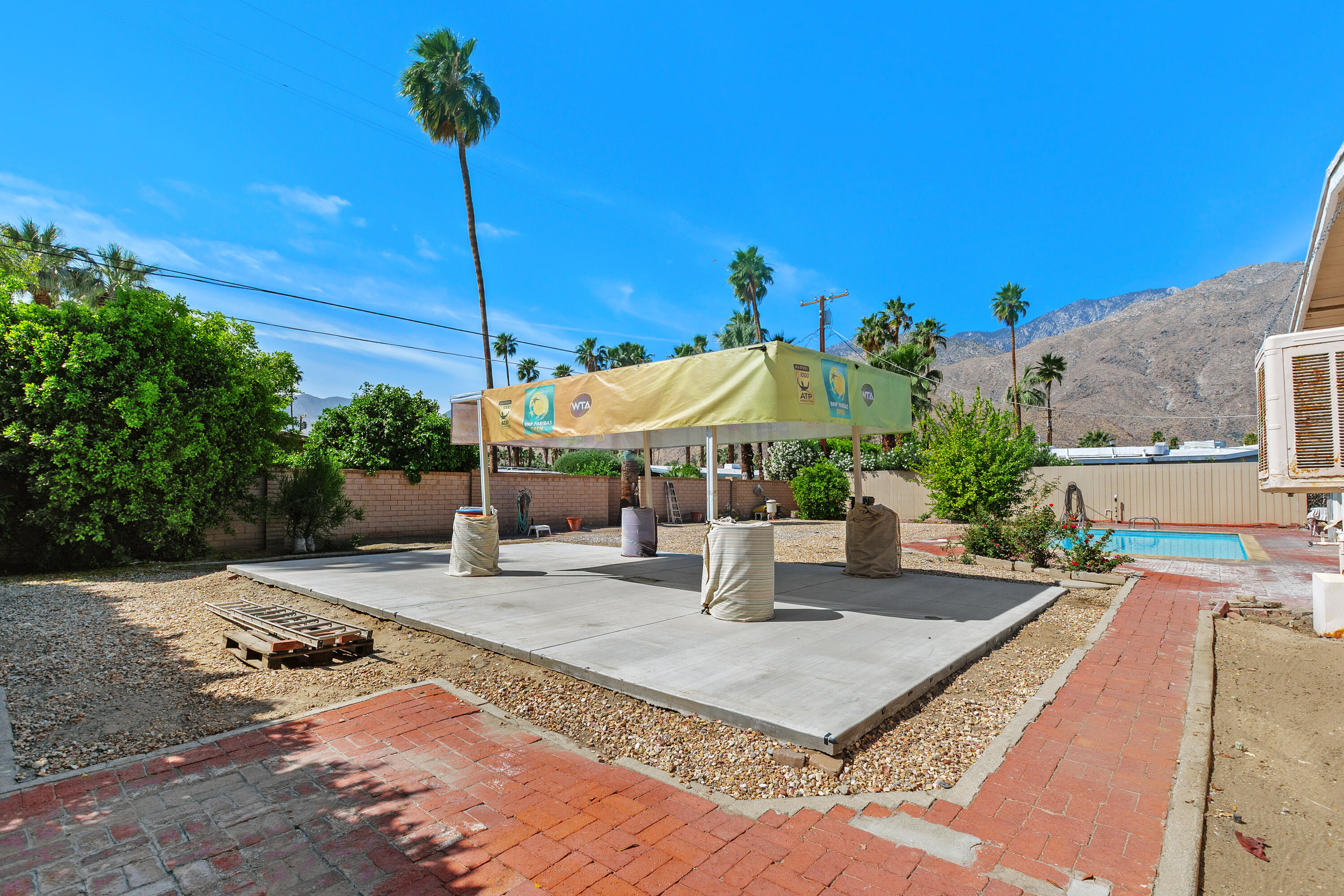 1077 South Riverside Drive Palm Springs, CA 92264 - Photo 29 of 35 a house view with a sitting space