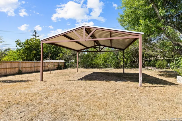 a view of a house with a street