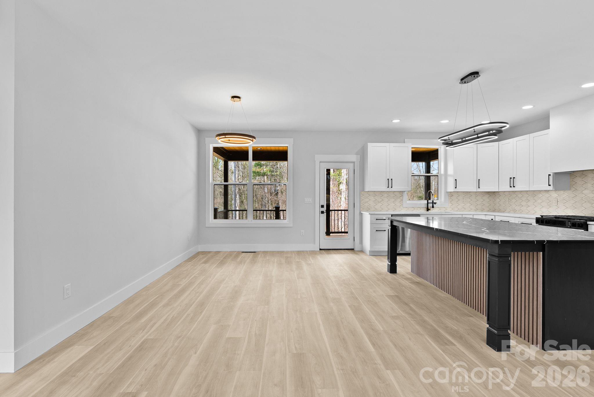 19 East Starnes Cove Road Asheville, NC 28806 - Photo 13 of 46 a view of kitchen with sink and window