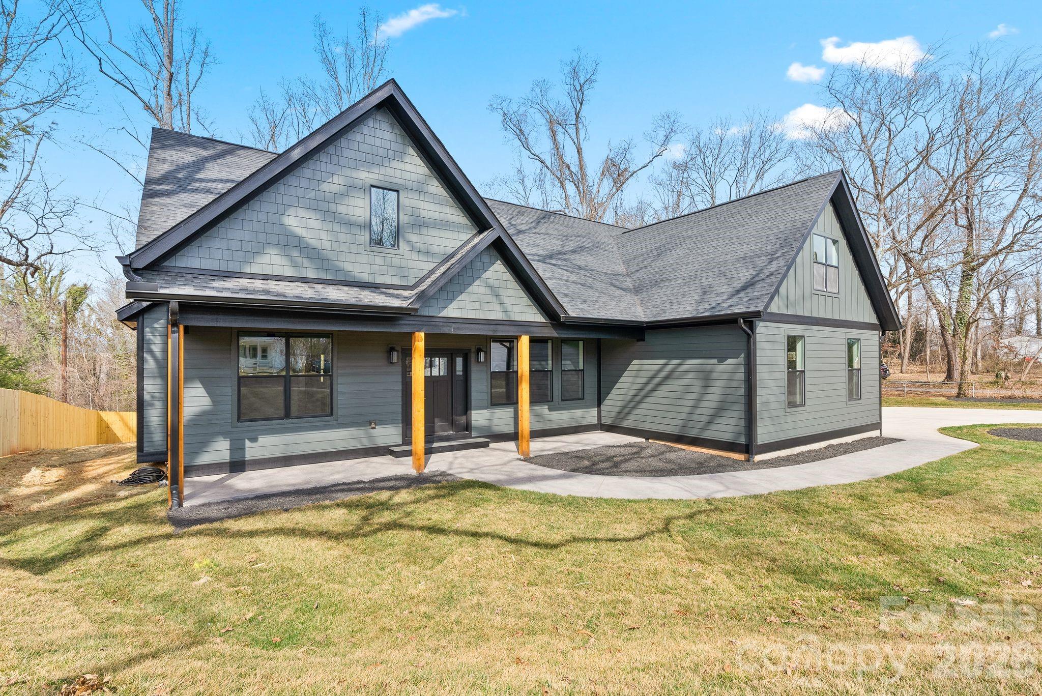 19 East Starnes Cove Road Asheville, NC 28806 - Photo 38 of 46 a view of a house with snow on the wall