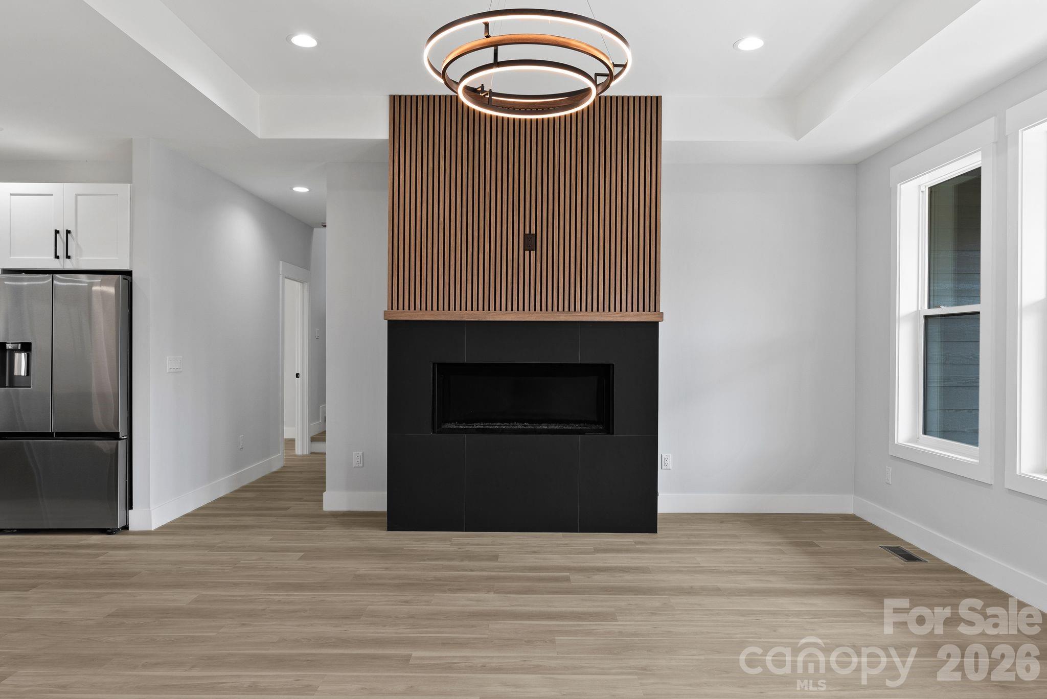 19 East Starnes Cove Road Asheville, NC 28806 - Photo 7 of 46 a view of a livingroom with a fireplace